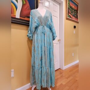 Elegant Blue Maxi Dress with Gold Details